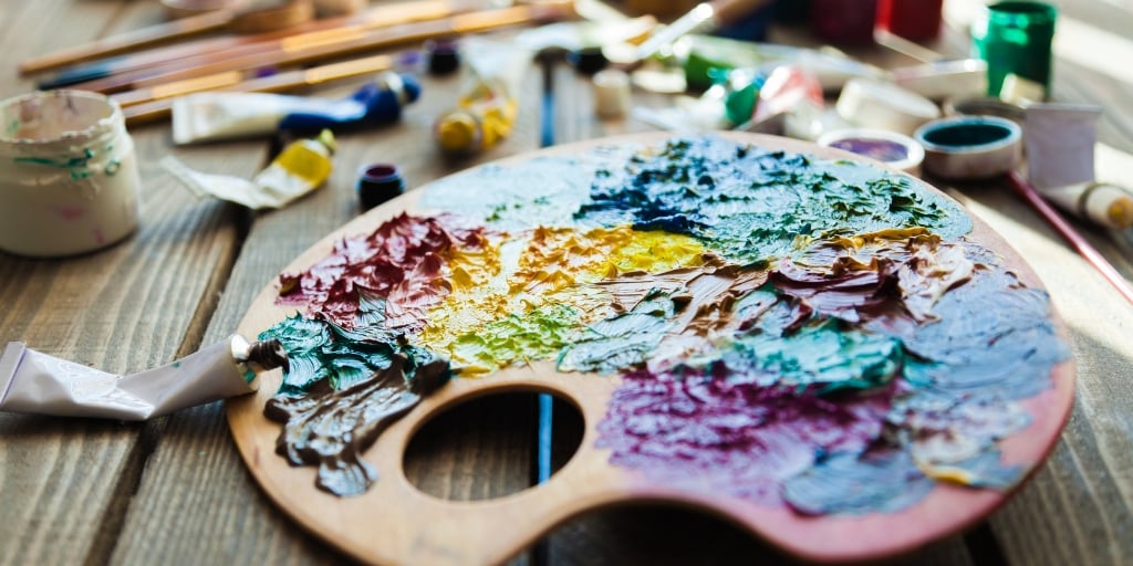 Hands creating pottery art